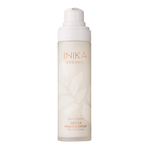 INIKA Organic Pure Biome Gentle Milk Cleanser 100ml open bottle with the pump lifted, front view on a plain white background, clear product photo