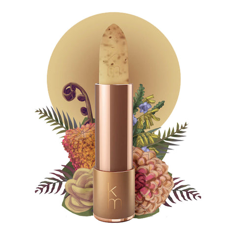Lip scrub set against a floral background. 