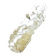 Swatch of lip scrub, translucent & exfoliating texture, with coconut sugar particles.
