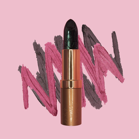 Double swatch showing the effect of the magic tint - lipstick appears black with green shimmer but adjusts to lips pH. 