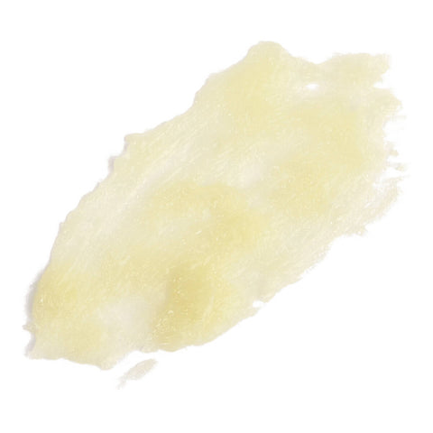 Swatch of moisture stick, translucent lip balm perfect for wearing overnight or even on top of lipsticks. 