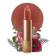 Peachy warm nude shade, gold lipstick case against a floral background. Lipstick detailed with KM initials & flower on the tip. Natural, clean cosmetics.