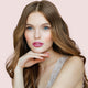 Young woman with fair skin tone & dark blonde hair wearing pink starlet lipstick.
