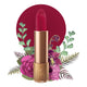 Lipstick detailed with vines & a flower on the tip, set against a floral background. 