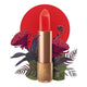 Lipstick detailed with KM initials & flower on the tip, set against a floral background. 