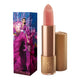 Lipstick next to box packaging that pictures a woman in a bright pink-purple dress. Gold lipstick case with flower detail on lid. 