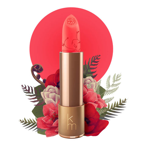 Lipstick detailed with vines & flower on the tip, set against a floral background. 