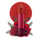 Lipstick detailed with vines & flower on the tip, set against a floral background. 