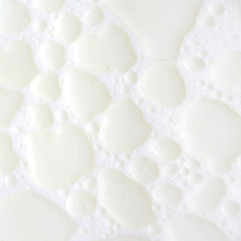 Swatch of milky mushroom gentle cleansing oil, thin bubbly 'milky' looking formula. 