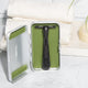 Leaf Shave Single Edge Travel Case lifestyle shot of the open case holding a razor, beside white towels and a plant, styled lifestyle photo