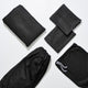 Life Basics by Nourished Life Eco Bamboo Sheet & Pillow Set Charcoal, black folded sheets, two pillowcases and a drawstring bag, overhead