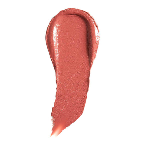 Nude pink-coloured 'birthday suit' lipstick swatch on a white background. 