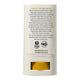 A white cylindrical cosmetic tube with a printed back panel showing ingredients and logos, photographed on a plain white background.