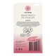 The back of a Little Urchin lip balm tube or packaging card, showing product ingredients, icons, and a pink balm stick illustration above a barcode on a white-to-pink gradient background.