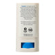 Back view of 20g tube of Natural Zinc Stick SPF 50+, a clear, hydrating, vegan formula that provides UVA and UVB broad spectrum protection from the sun while also being 4 hours water-resistant. The back shows the ingredients. Packaged in a cream tube with minimal blue and black text on the label.