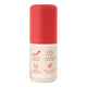 A cylindrical sunscreen bottle with a vibrant coral-red cap and a cream-colored lower body, featuring red text and icons highlighting product features.