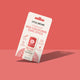 Cradboard packaging of Little Urchin Red Coloured Zinc Stick SPF 50+ sunscreen stick, shown at an angle on a solid coral pink background with a soft shadow.