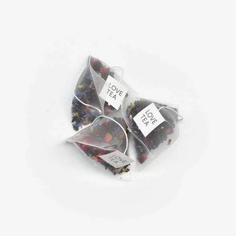Love Tea Earl Grey Pyramid Tea Bags, blend of Ceylon black tea, floral petals, and bergamot essential oil.