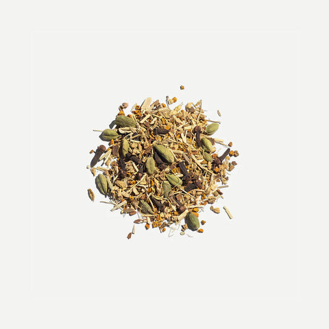 Love Tea Kapha Loose Leaf Tea leaves, Ayurvedic herbal blend with ginseng, turmeric, ginger, and cinnamon.