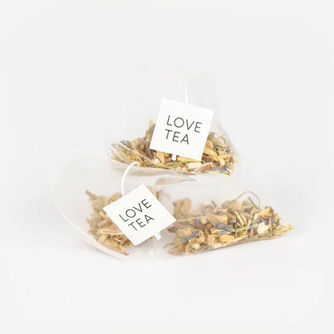 Love Tea Vata Pyramid Tea Bags, two pyramid tea bags with Love Tea tags on a plain white background, clear product photo, single image
