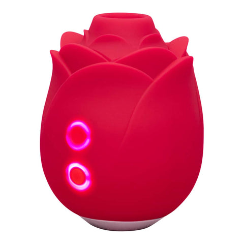 Red rose shaped sex toy with buttons lit up.
