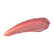 Luk Beautifood Lip Nourish Nude Pink 3g swatch, a creamy smear of coral rose lip colour, close up on a plain white background