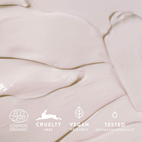 Close-up swatch of intense repair body cream. Thick and creamy, absorbs well. vegan friendly, cruelty free, COSMOS organic eco cert. 
