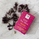 New Nordic Irish Sea Moss supplement with sea moss on a marble surface