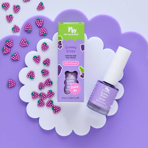 No Nasties Gummy Grape scented kids nail polish with packaging on a purple background.