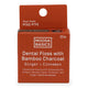 Front of Noosa Basics Dental Floss with Bamboo Charcoal - Ginger + Cinnamon flavour. Cinnamon coloured packaging.