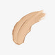 Shell Beige concealer swatch on a white background.