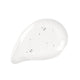 Nude By Nature Lash and Brow Boosting Serum swatch, a clear gel dollop with small bubbles, close up on a plain white background