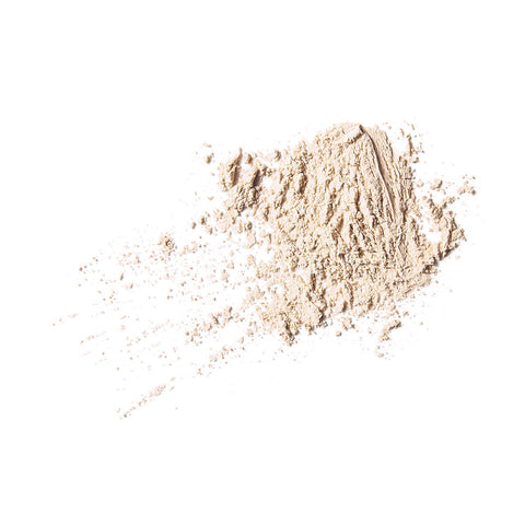 Nude By Nature Translucent Loose Finish Powder 01 Natural swatch, a soft smear of pale translucent powder, close up on a plain white background
