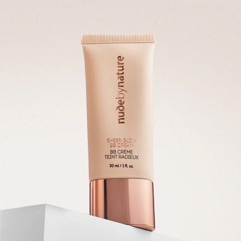 Tube of Nude by Nature BB cream on a light beige background.