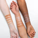 Three arms with different skin tones displaying BB cream swatches on a white background.