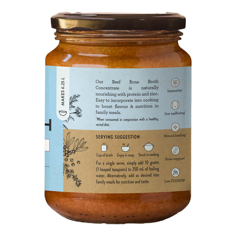 Nutra Organics Beef Bone Broth Concentrate Natural Beef 250g glass jar turned to show the right side of the blue label, with small print on white