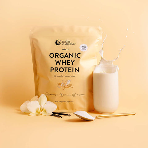 Nutra Organics Organic Whey Protein - Vanilla 750g package with vanilla flowers and a scoop on a yellow background.