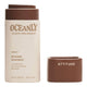 8.5g stick of Oceanly ebony bronzer in cardboard packaging on a white background with the cap off. 