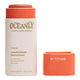 8.5g stick of Oceanly corail blush in cardboard packaging on a white background with the cap off. 