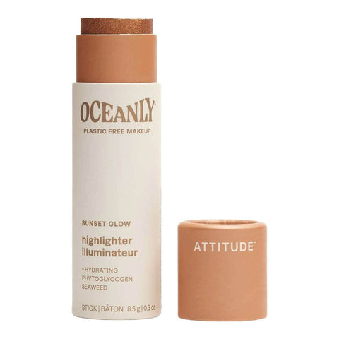 Oceanly Highlighter Sunset Glow 8g, an open cream stick tube with its copper cap beside it on white, clear product photo, single image