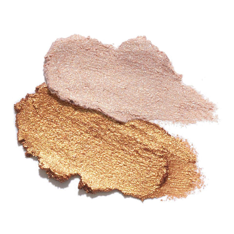Oceanly Highlighter swatch, smears of pink and gold shimmery highlighter, close up on a plain white background, clear product photo