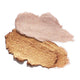 Oceanly Highlighter swatch, smears of pink and gold shimmery highlighter, close up on a plain white background, clear product photo