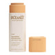 Oceanly Light Coverage Foundation Dune 12g, an open cream stick tube with its caramel peach cap beside it on white, clear product photo