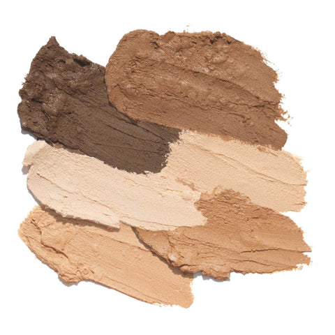 Oceanly Light Coverage Foundation swatch, smears of foundation from pale cream to deep brown, overhead on a plain white background