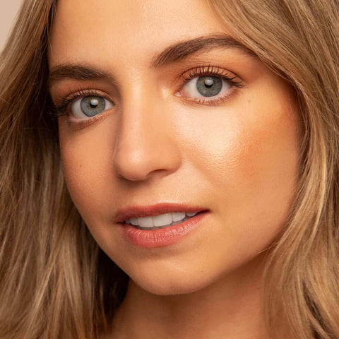Oceanly Mascara + Serum lifestyle close up portrait of a woman with light eyes and defined lashes, styled lifestyle photo, single image