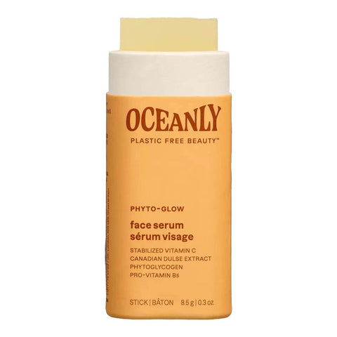 Oceanly Phyto-Glow Face Cream 8g open orange stick tube showing the pale cream balm on a plain white background, clear product photo