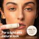 Oceanly Silky Pink Gift Set lifestyle shot of a woman with dark hair holding a stick makeup tube near her lips, with the words for a light look