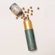 Ode Health Cordyceps Mushroom honey pearls spilling out of packet on a white background. 