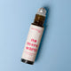 Roll-on bottle with 'no more warts' label on a blue background
