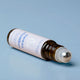 Plant Therapy Essential Roll-on Blend - Sweet Slumber 10ml product on a blue background.
